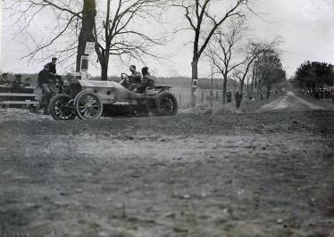 From the Luttgen Album: Driver Foxhall Keene Taking the Turn at Colyers Corner in Plainview