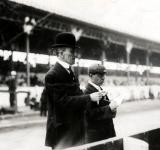 Mystery Friday Foto #34 Solved: Track Announcer Peter Prunty in front of the 1908 Grandstands.
