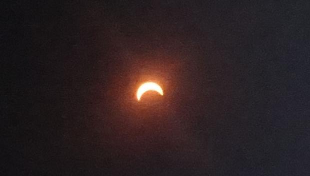 The Sun at East Hills, New York at 2:43 PM and the Total Eclipse Seen in Oregon