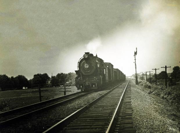 Mystery Foto #18 Solved : A Train Passing the Mineola LIRR  Motor Parkway Bridge Heading East