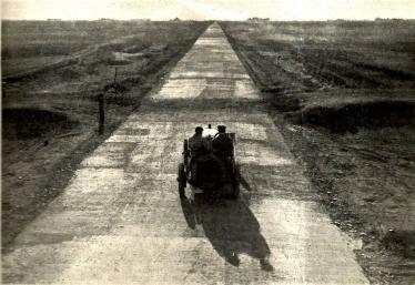 Mystery Friday Foto #32 Solved: Joe Tracy testing the Motor Parkway as seen on the Jerusalem Avenue Bridge looking west in September 1908