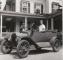 Henry Austin Clark, Jr., in his first car - a 1915 Ford Model T.