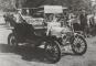 Henry Austin Clark, Sr., sitting in the back seat of  a 1910 Ford.